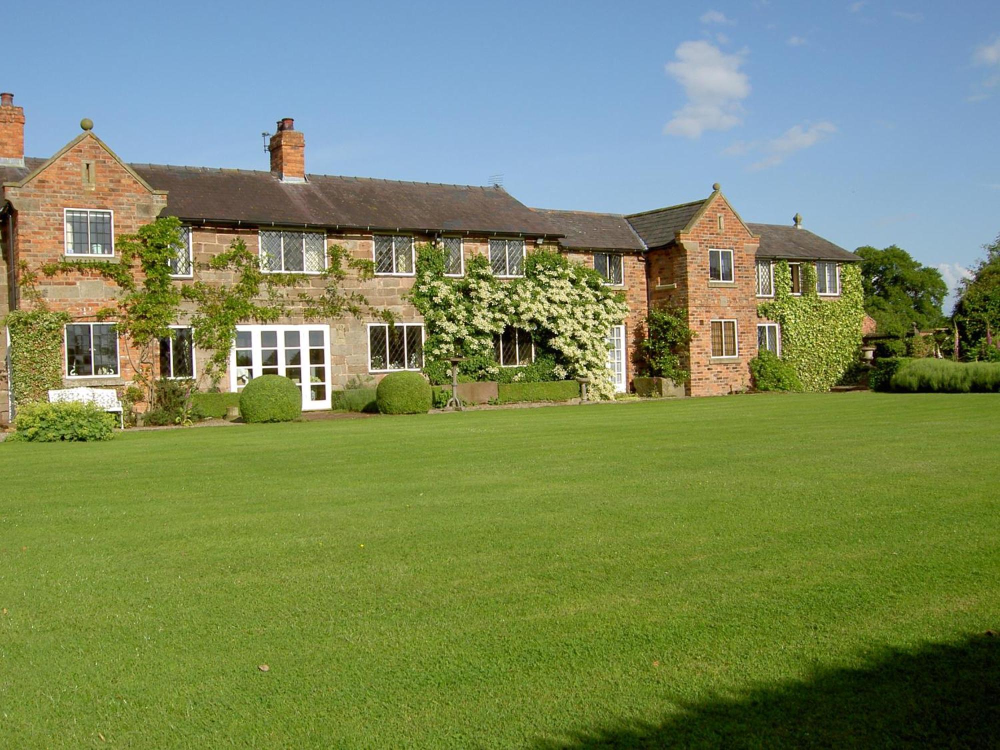 לינה וארוחת בוקר Malpas  Manor Farm Egerton חדר תמונה